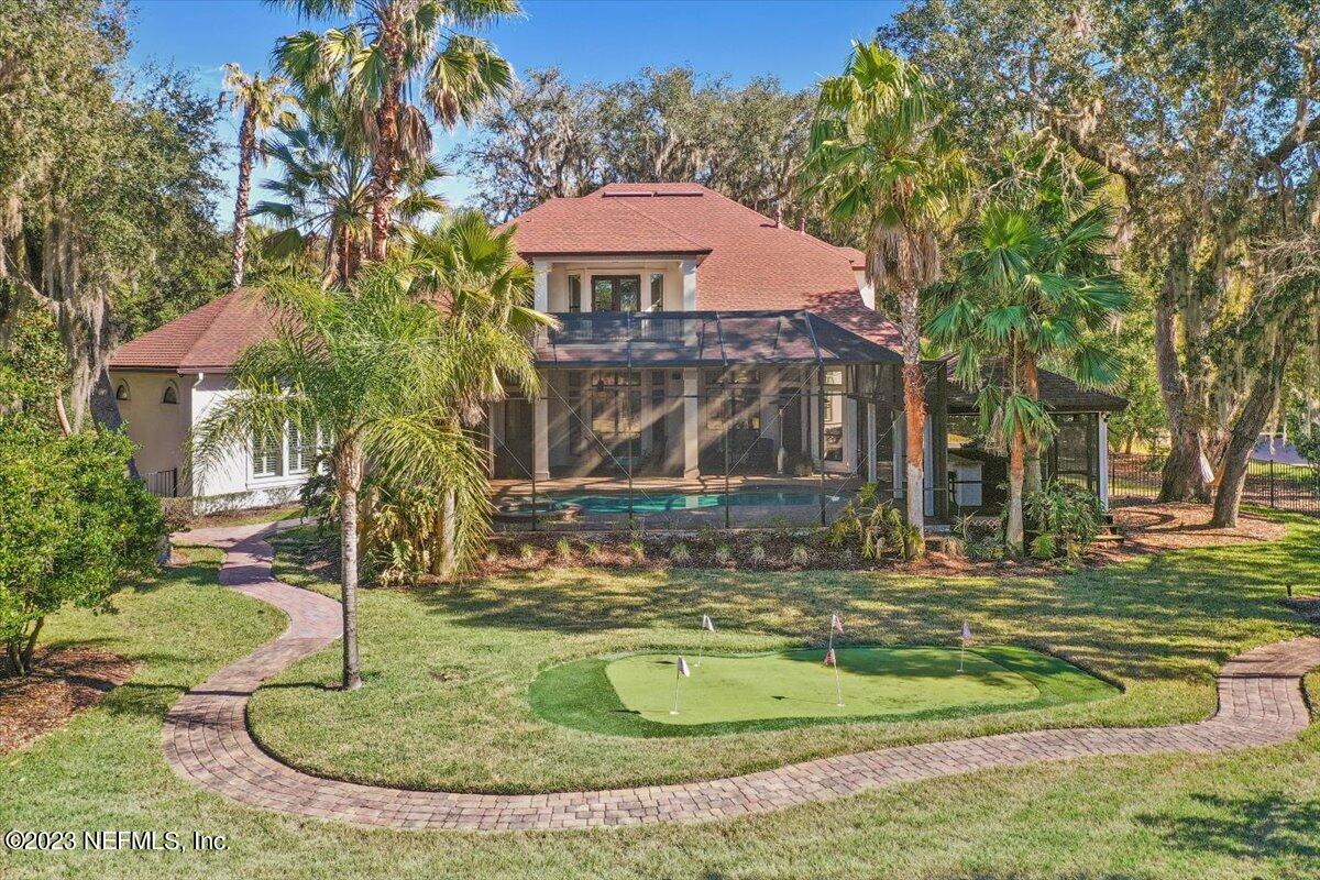 142 Marshall Creek Drive St. Augustine, FL 32095 - Photo 43 of 61 a view of a house with a yard