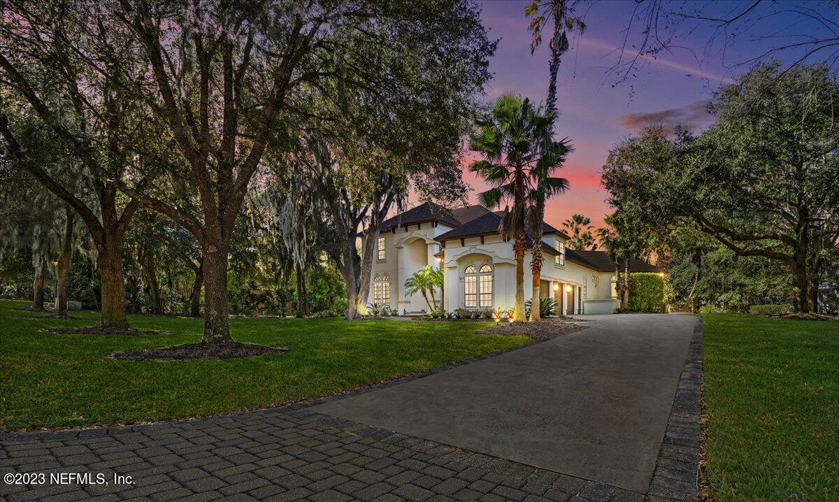 142 Marshall Creek Drive St. Augustine, FL 32095 - Photo 49 of 61 a front view of a house with a yard