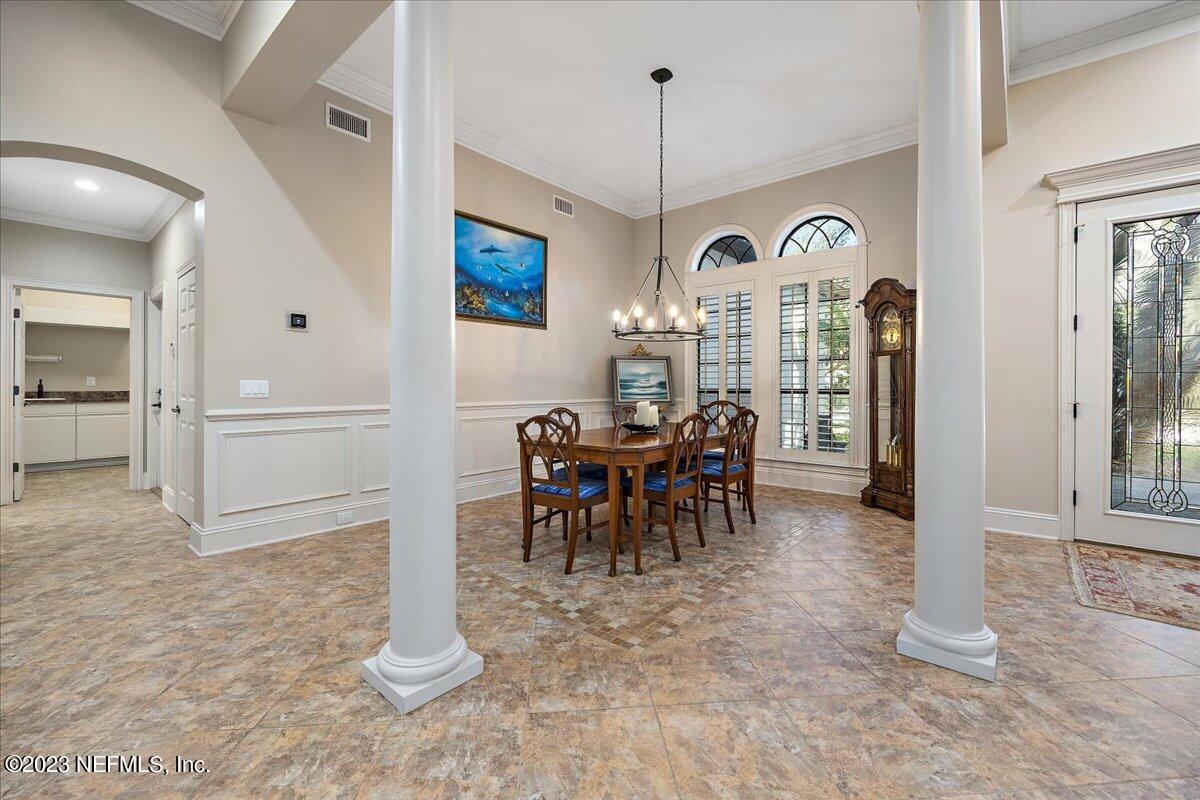142 Marshall Creek Drive St. Augustine, FL 32095 - Photo 9 of 61 a view of a dining area with furniture
