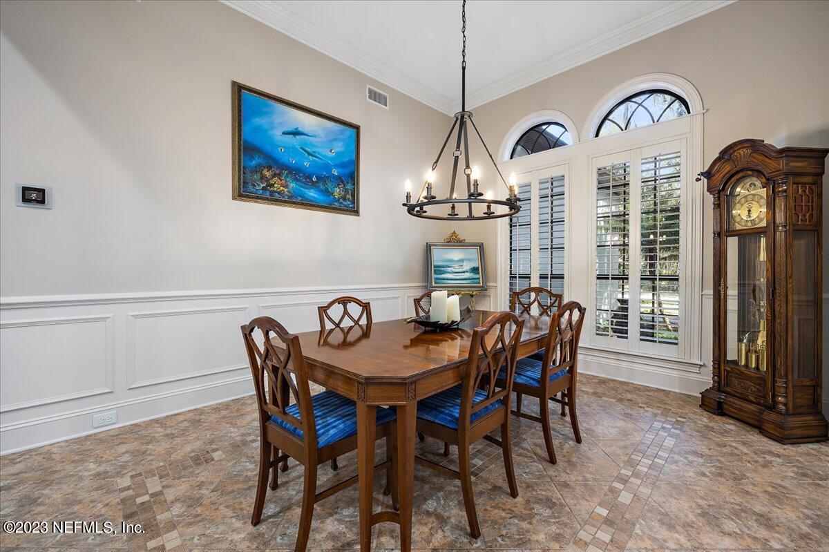 142 Marshall Creek Drive St. Augustine, FL 32095 - Photo 10 of 61 a view of a dining room with furniture window and outside view
