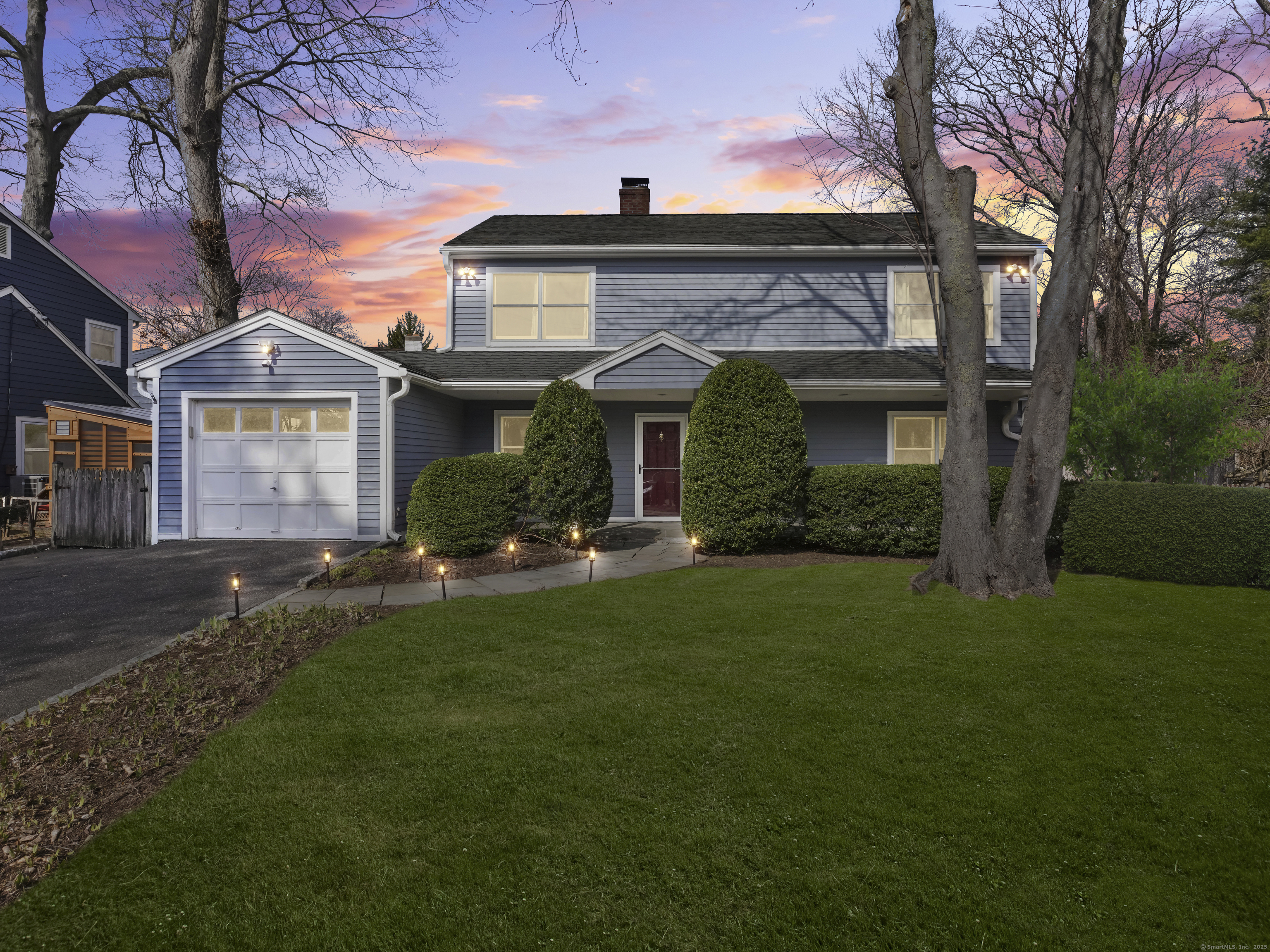 8 Saddle Road Norwalk, CT 06851 - Photo 1 of 1 Welcome to 8 Saddle Rd in the desirable Wolfpit area, a classic two-story home with a single attached garage, with mature shrubs framing the spacious front yard. This inviting property combines timeless curb appeal with practical suburban living.