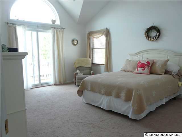 85 Club House Road Brick, NJ 08723 - Photo 11 of 20 a bedroom with a bed and window