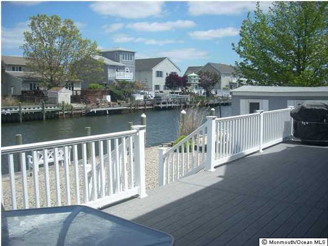 85 Club House Road Brick, NJ 08723 - Photo 17 of 20 a view of a lake from a balcony