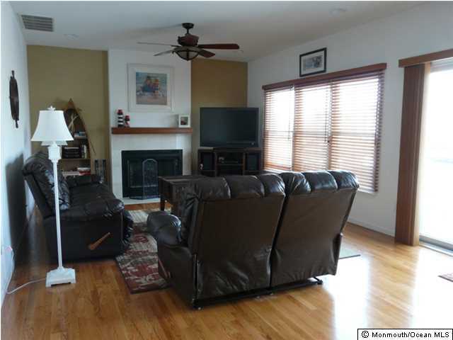 85 Club House Road Brick, NJ 08723 - Photo 5 of 20 a living room with furniture window and a fireplace