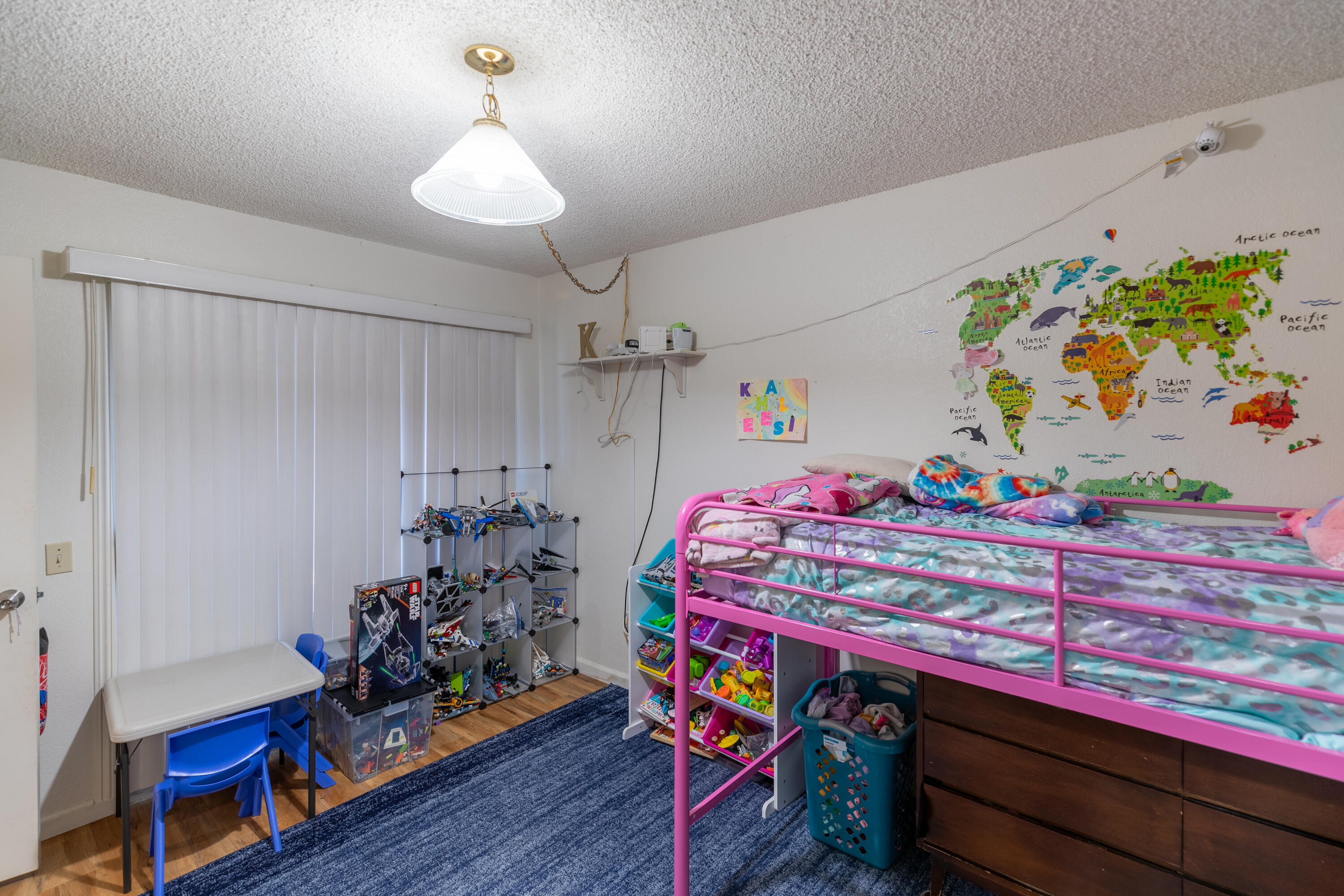 920 North M Place Lompoc, CA 93436 - Photo 12 of 25 a bedroom with furniture and wooden floor