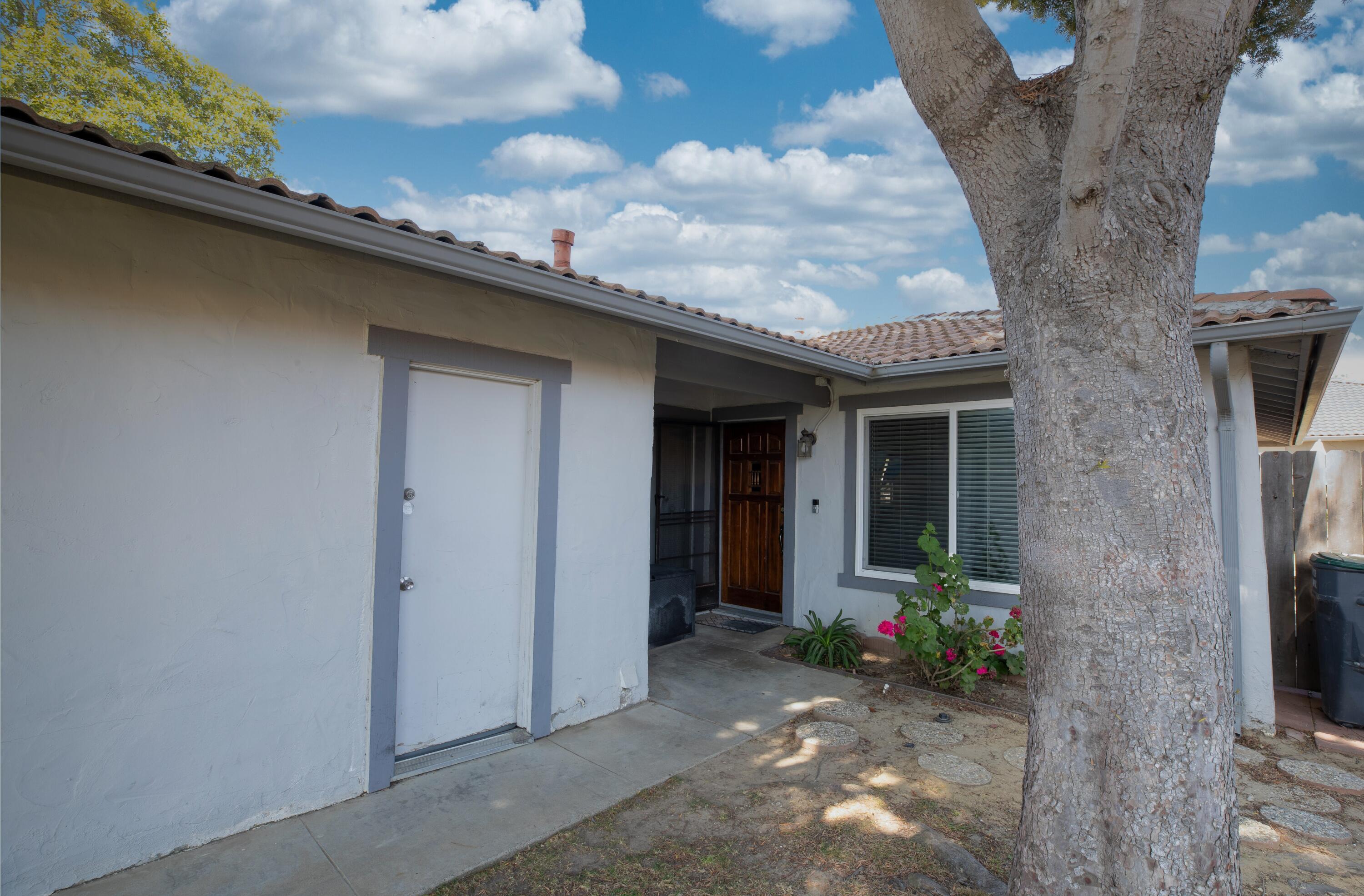 920 North M Place Lompoc, CA 93436 - Photo 4 of 25 a front view of a house with outdoor space
