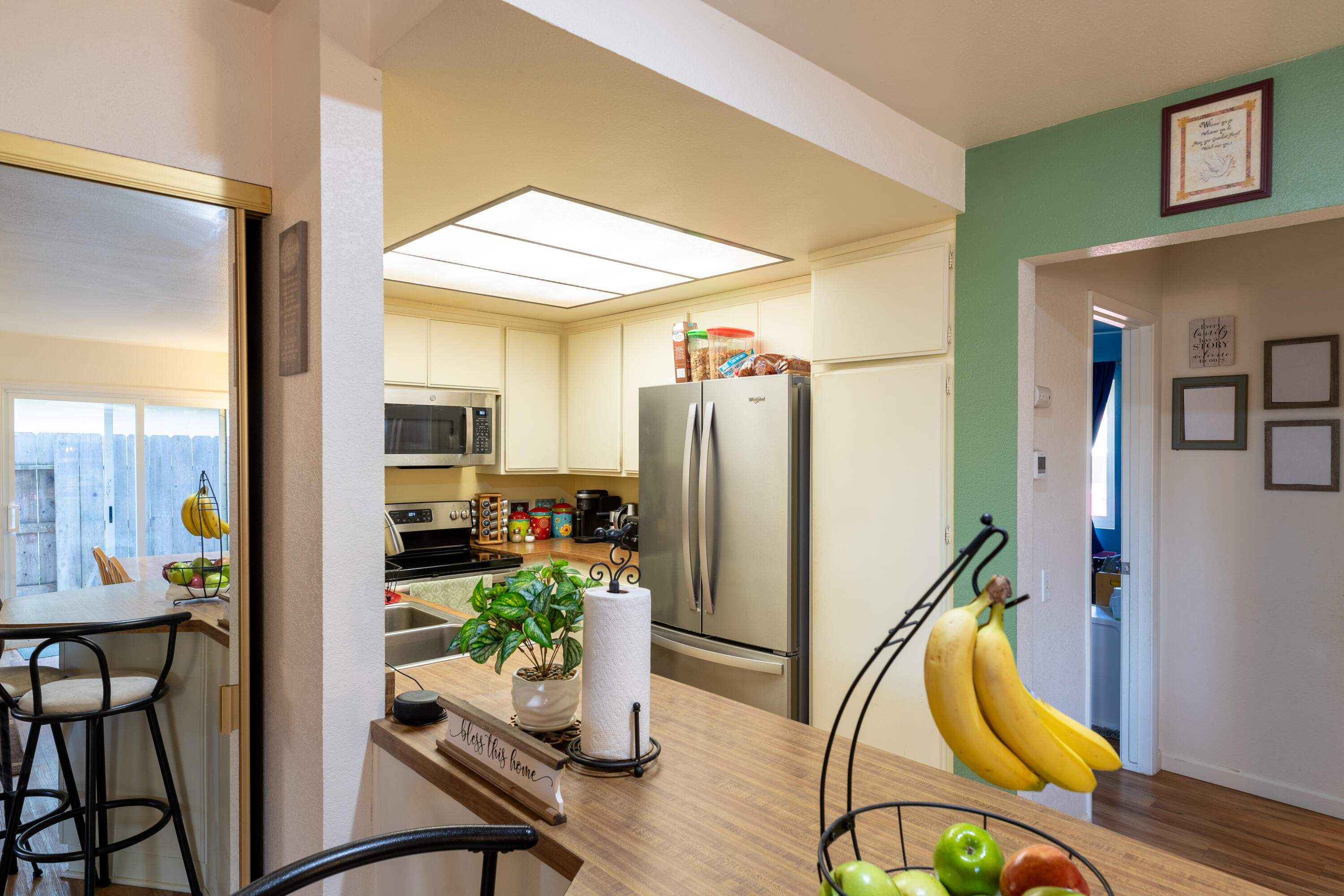 920 North M Place Lompoc, CA 93436 - Photo 9 of 25 a room with furniture a rug and a chandelier