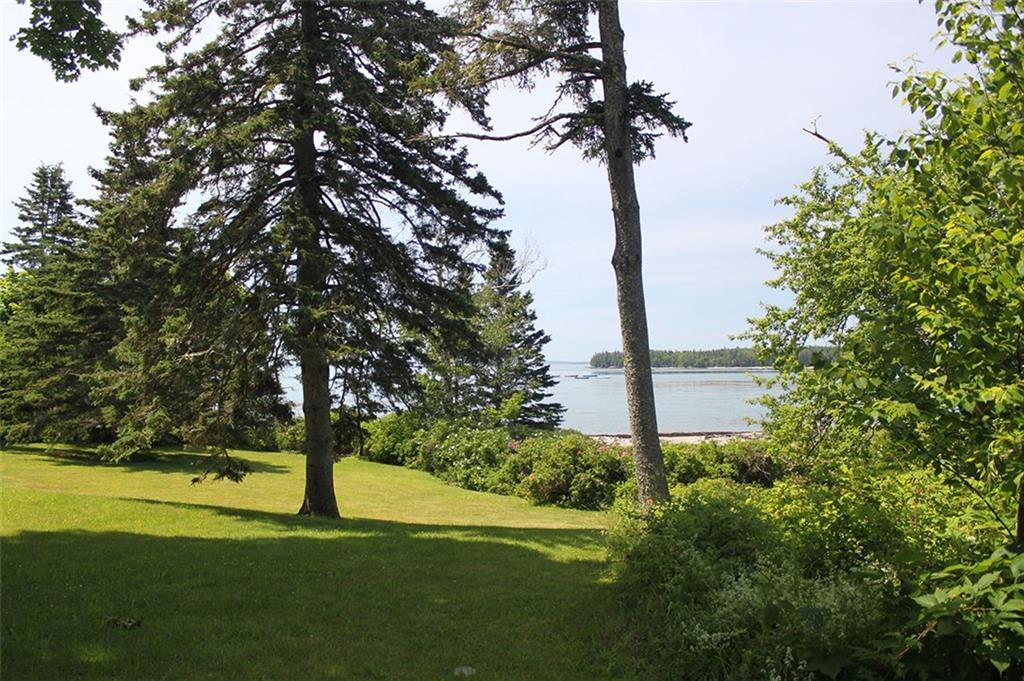 35 Southwest Harbor Road Deer Isle, ME 04627 - Photo 17 of 25 Lawn leading to beach.