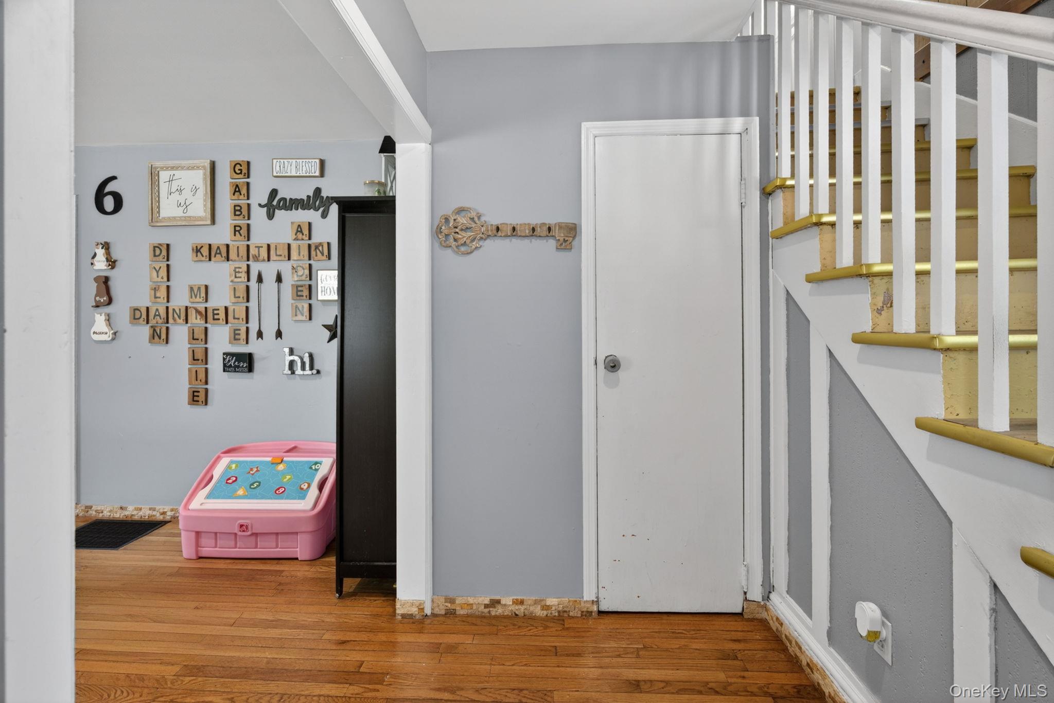 7 Walnut Street Poughkeepsie, NY 12601 - Photo 6 of 30 Step through the front door into a welcoming entryway featuring beautiful hardwood floors that add warmth and character from the moment you arrive.