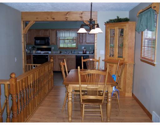 2024 Brodhead Road Aliquippa, PA 15001 - Photo 4 of 8 Dining Room. Dining room flows off of kitchen. Beautiful wood beams and wood accents throughout house. Laminate floor in dining room.