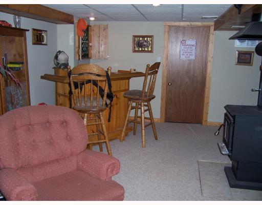 2024 Brodhead Road Aliquippa, PA 15001 - Photo 7 of 8 Den/Family/Great Room. Family Room with woodburner that has fan to circulate warm air to upstairs. Great way to keep your gas bills low. Full bath room downstairs also laundry room and entry way from 1 1/2 car garage.