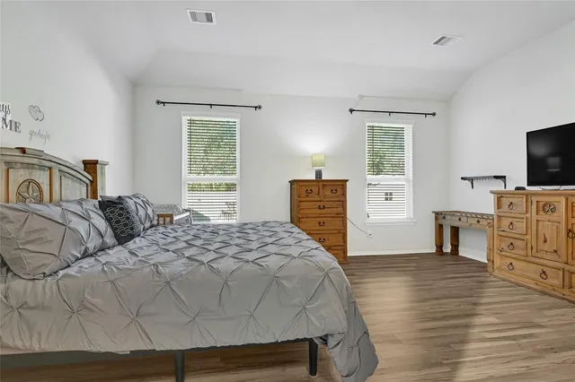 a spacious bathroom with a double vanity sink mirror and double