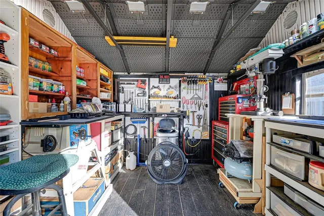 a view of a house with swimming pool and porch