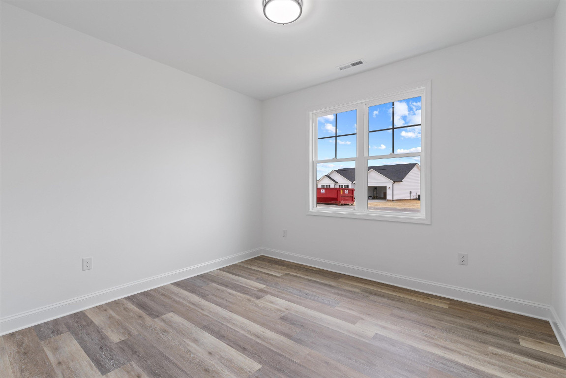 4000 Origin Drive Bailey, NC 27807 - Photo 17 of 47 a room with a book shelf and a window