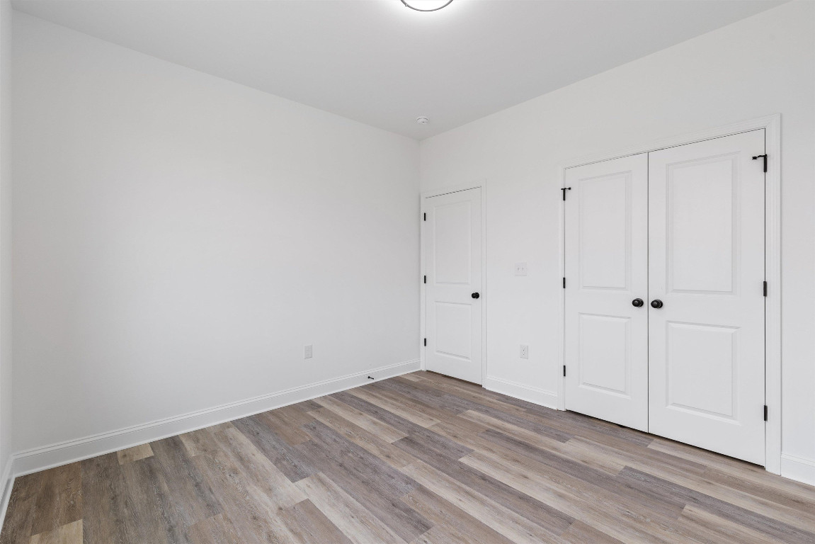 4000 Origin Drive Bailey, NC 27807 - Photo 18 of 47 a view of room that has wooden floor