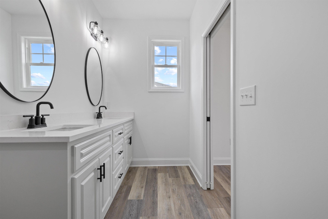 4000 Origin Drive Bailey, NC 27807 - Photo 32 of 47 a bathroom with 2 sink and a mirror