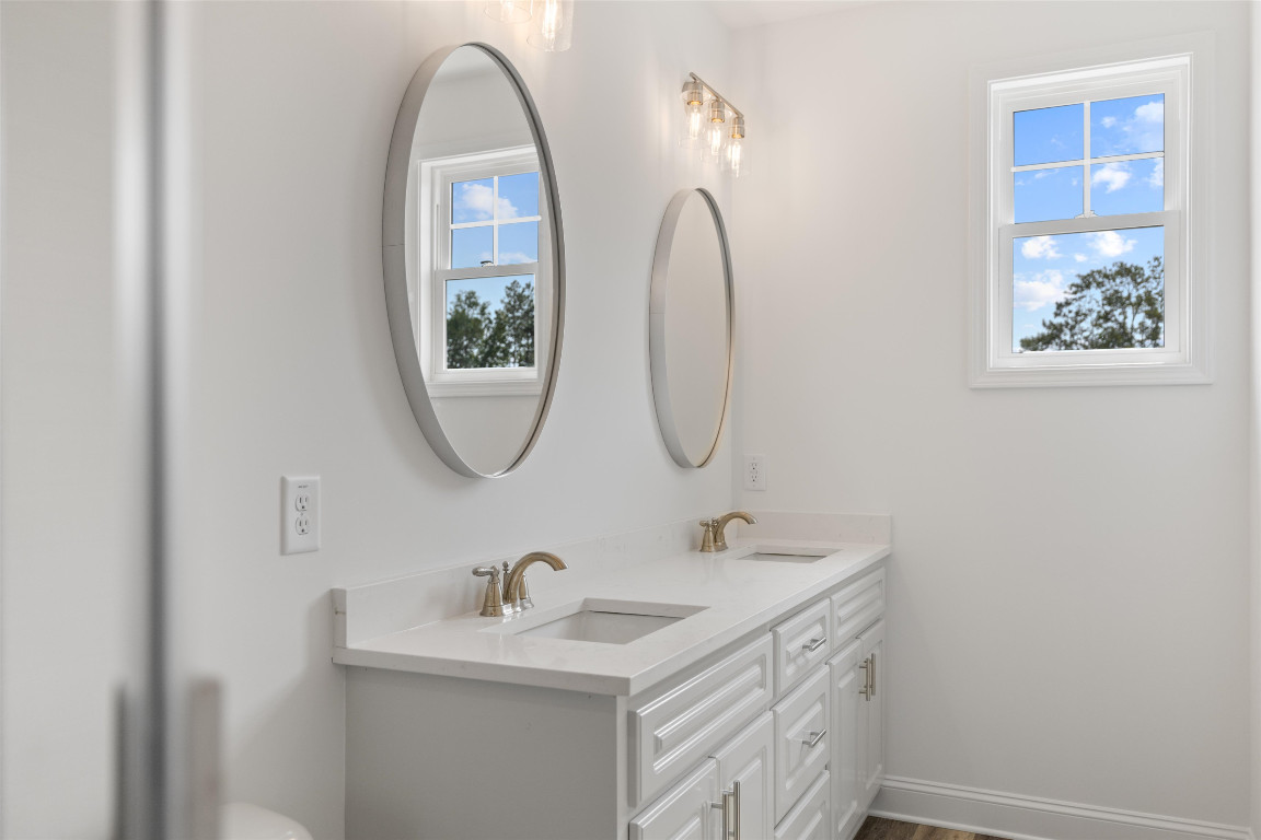 4000 Origin Drive Bailey, NC 27807 - Photo 40 of 47 a bathroom with a sink and a mirror