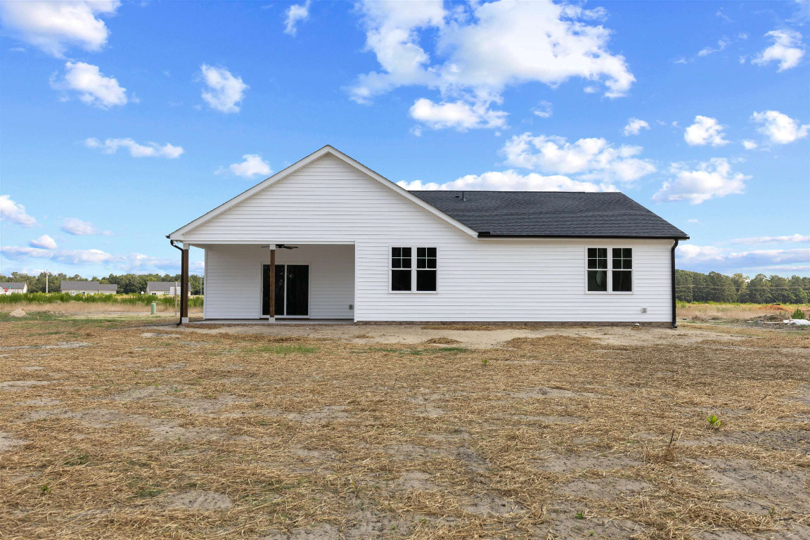 4000 Origin Drive Bailey, NC 27807 - Photo 44 of 47 a front view of house with yard and lake view