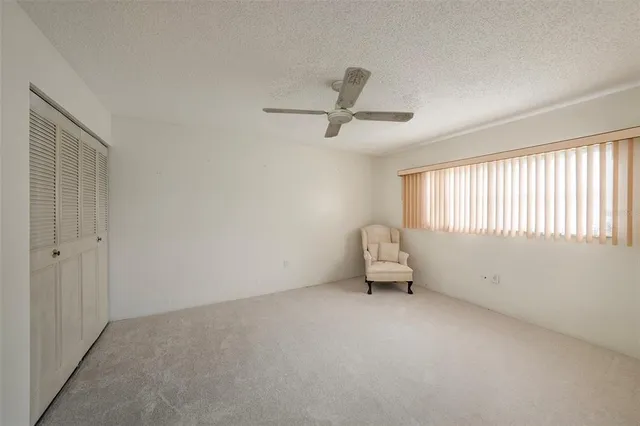 a bathroom with a sink mirror and a bathtub