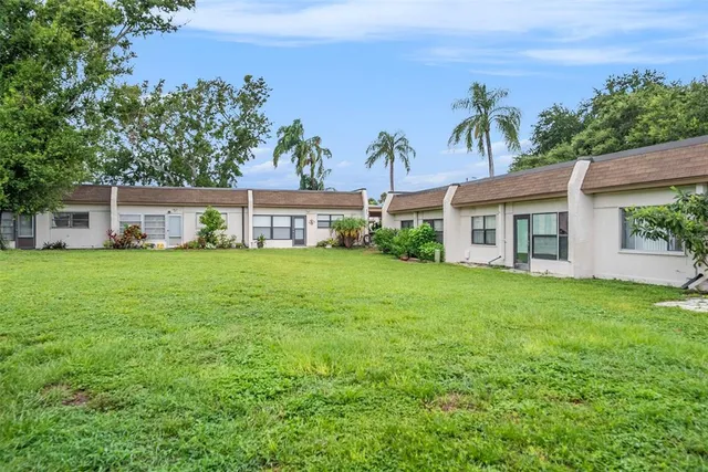 a view of a house with a big yard