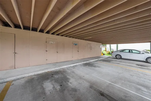 a view of a swimming pool with a yard