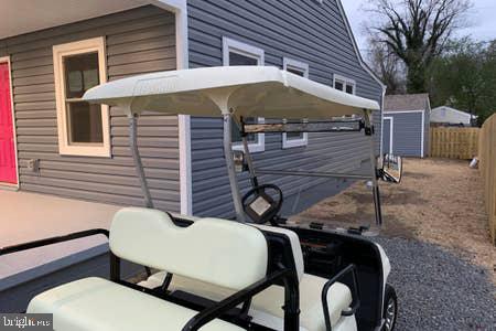 6145 5th Street King George, VA 22485 - Photo 18 of 29 a backyard of a house with table and chairs