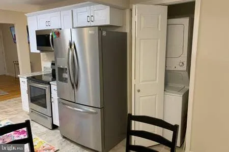 a view of a cafe with sitting area