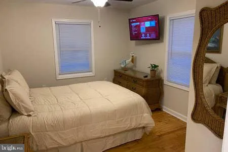 a kitchen with stainless steel appliances granite countertop a refrigerator a stove and a sink