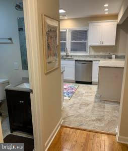 6145 5th Street King George, VA 22485 - Photo 9 of 29 a kitchen with stainless steel appliances granite countertop a refrigerator a stove and a sink