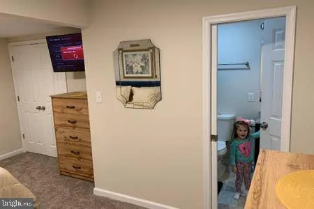 a view of a door and a window