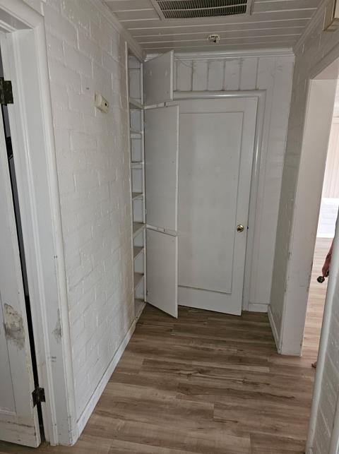 114 North J Street Madera, CA 93637 - Photo 11 of 20 a view of wooden floor