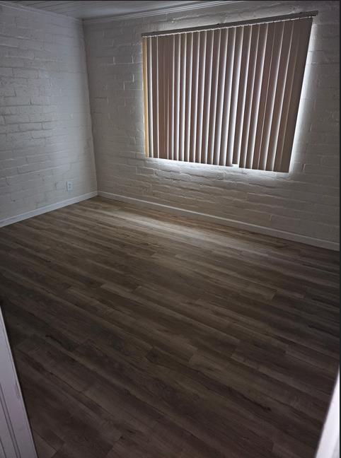 114 North J Street Madera, CA 93637 - Photo 15 of 20 a view of wooden floor