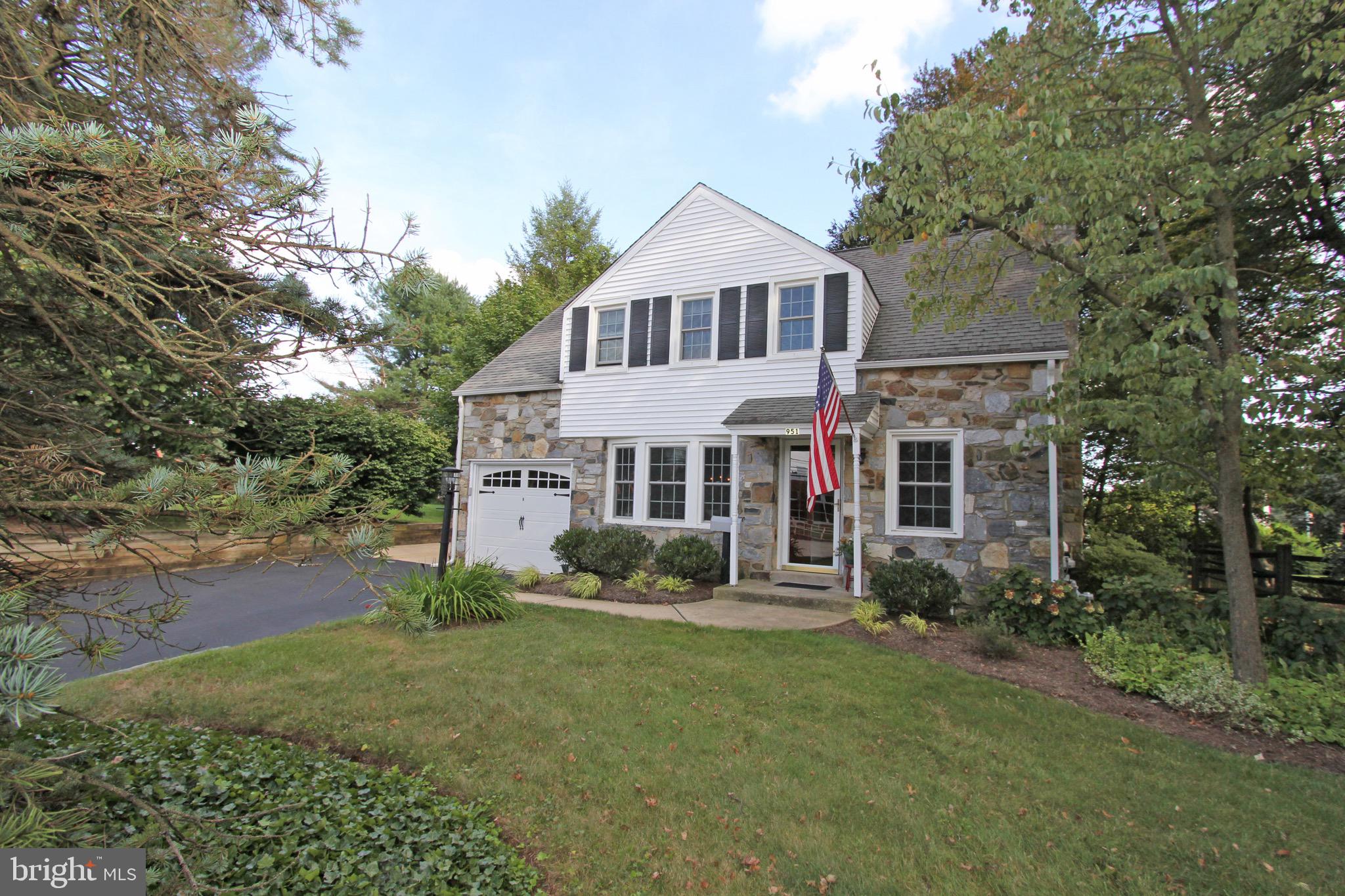 951 Conestoga Road Berwyn, PA 19312 - Photo 1 of 41 front view of a house with a yard