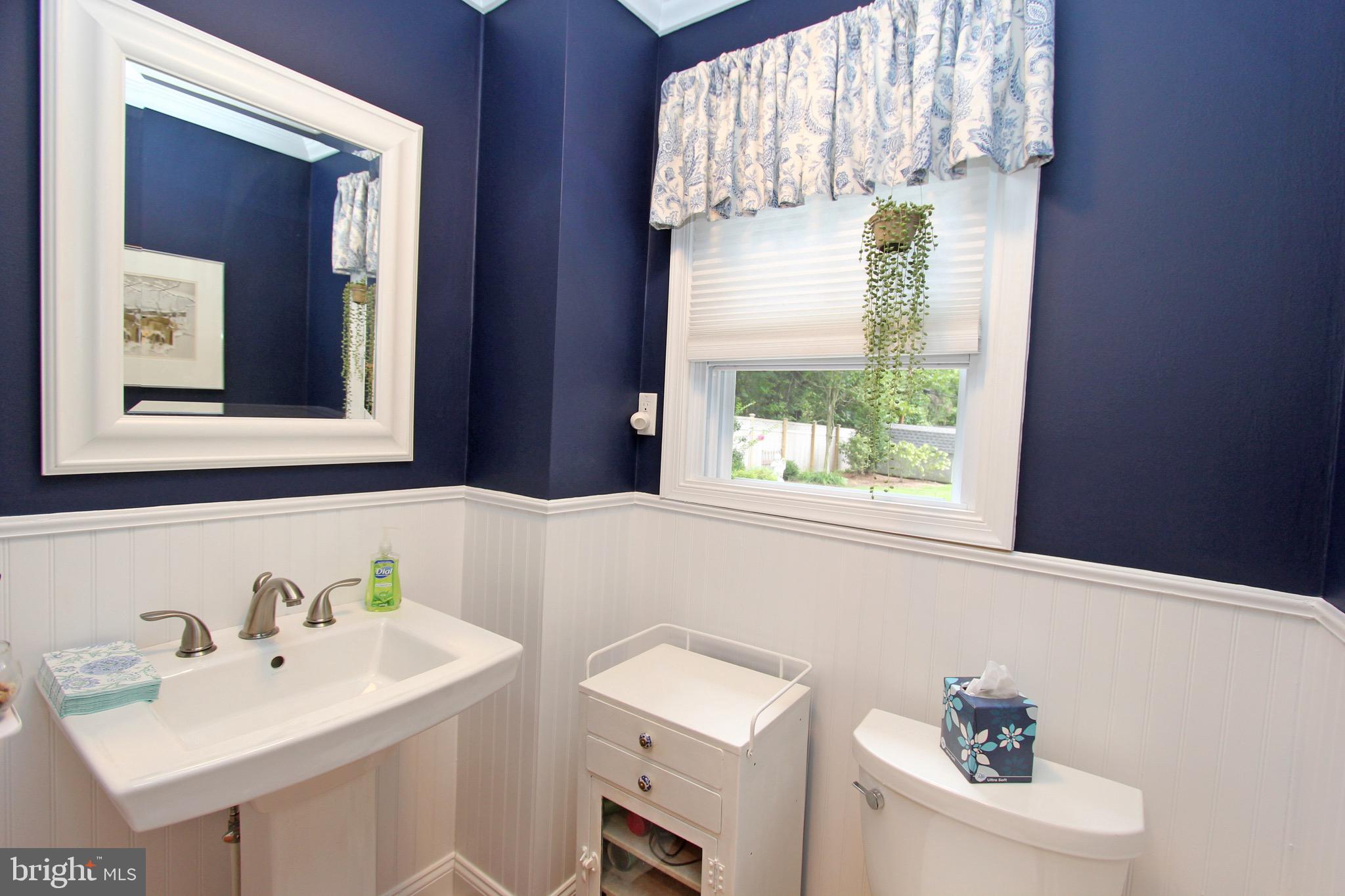 951 Conestoga Road Berwyn, PA 19312 - Photo 11 of 41 a bathroom with a sink and a window