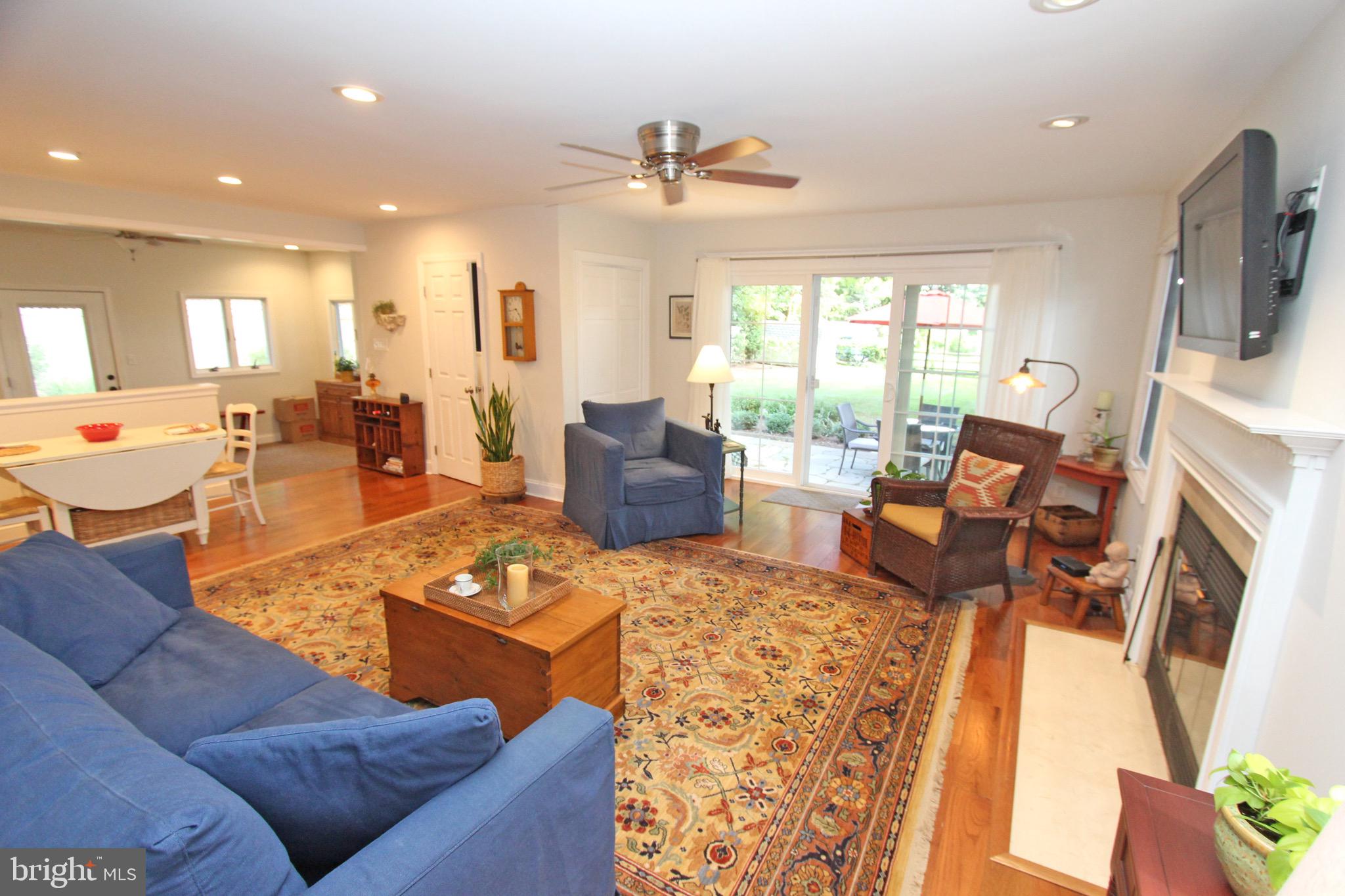 951 Conestoga Road Berwyn, PA 19312 - Photo 13 of 41 a living room with furniture fireplace and a large window