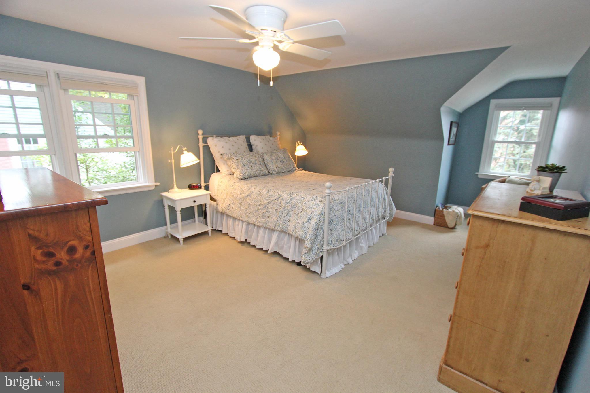 951 Conestoga Road Berwyn, PA 19312 - Photo 23 of 41 a bedroom with a bed dresser and a window