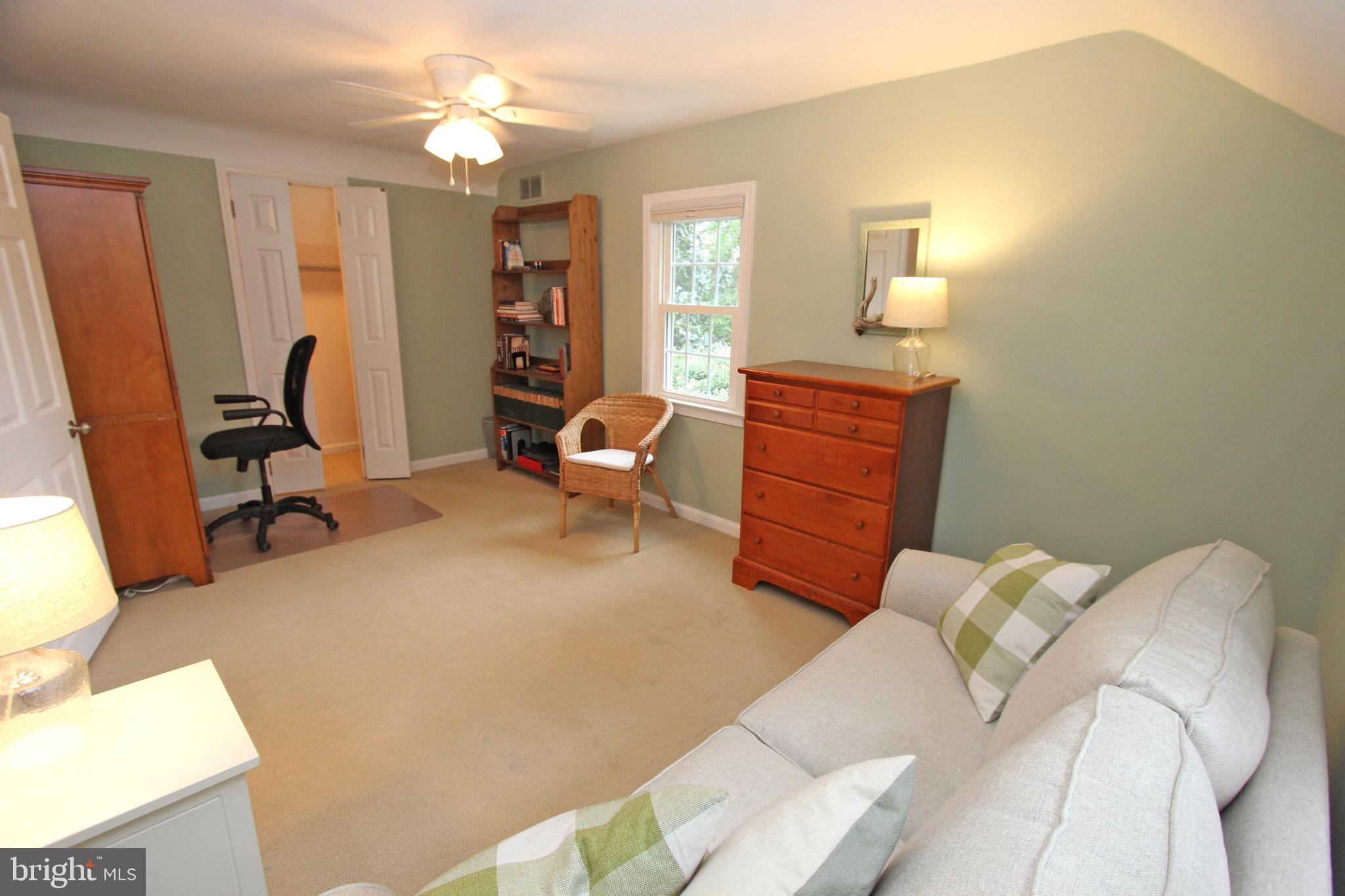 951 Conestoga Road Berwyn, PA 19312 - Photo 27 of 41 a bedroom with furniture and a mirror