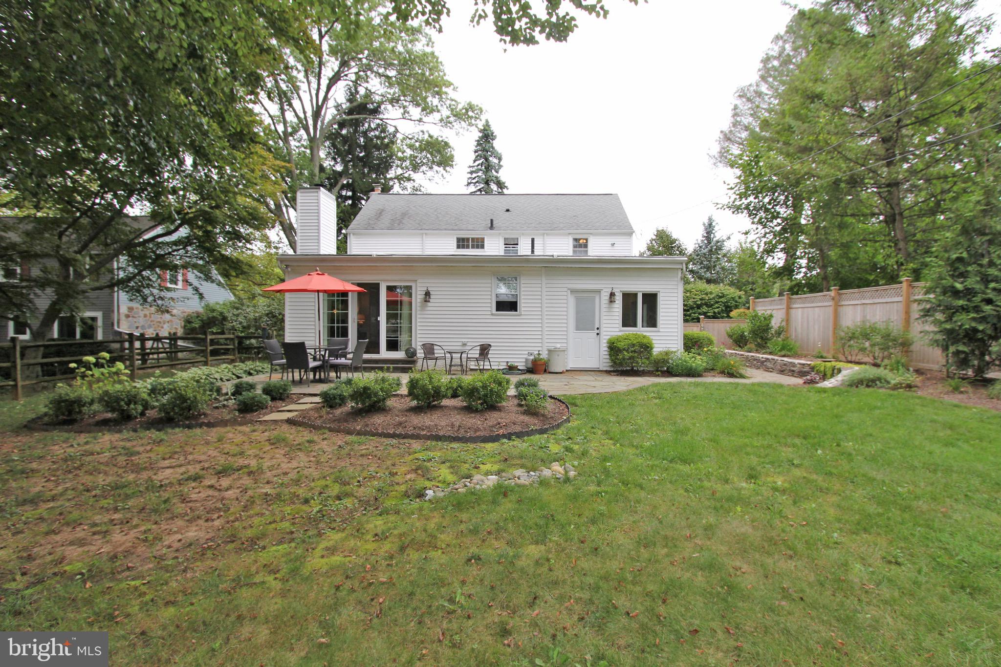 951 Conestoga Road Berwyn, PA 19312 - Photo 36 of 41 a front view of house with yard and green space