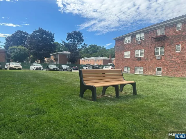 a view of a bench in the garden
