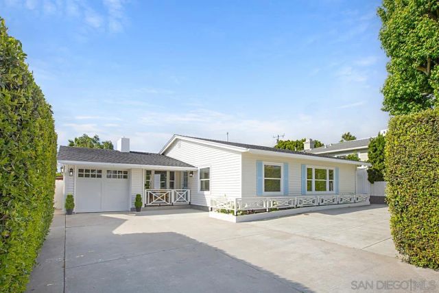 front view of a house with a street