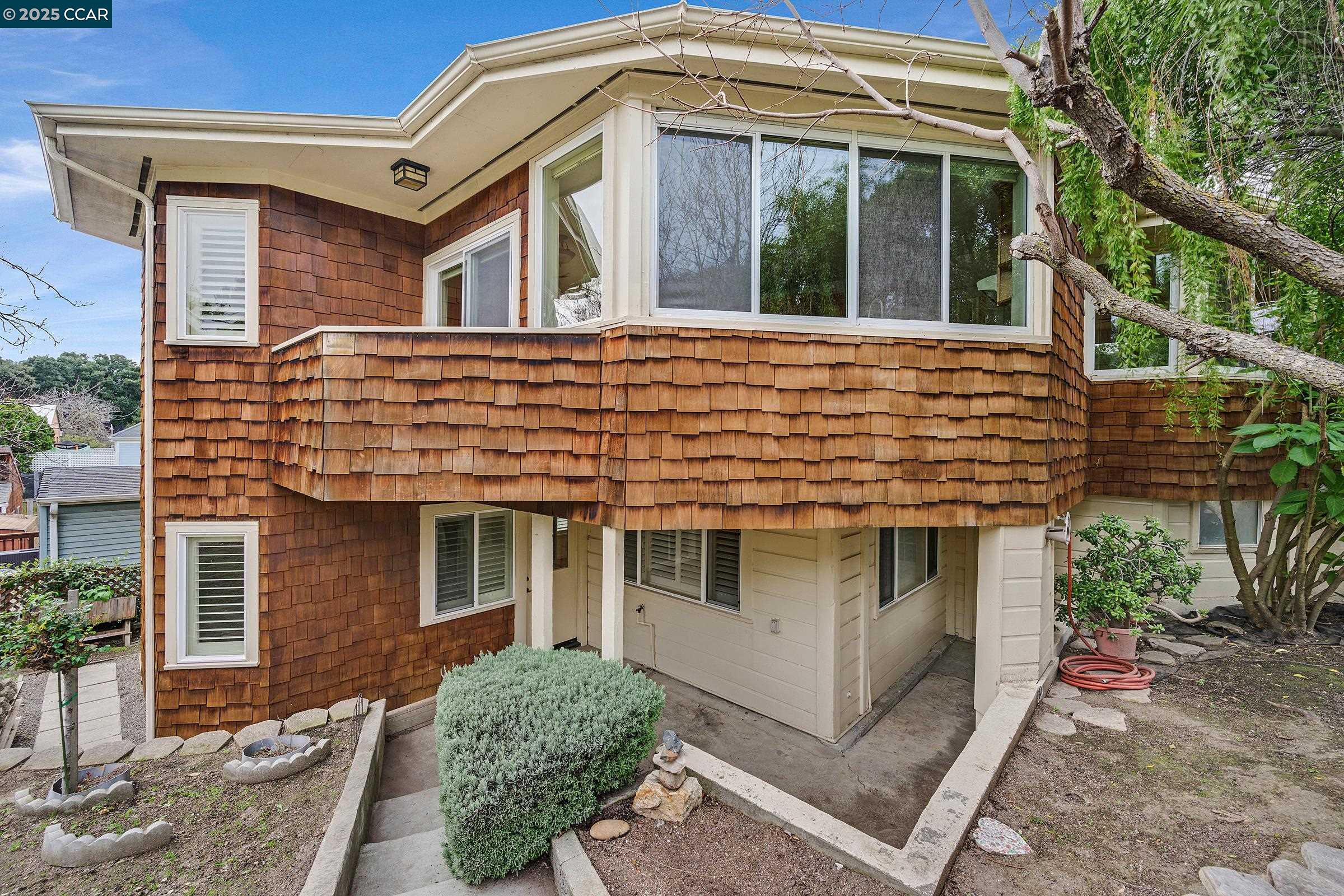 2581 Charles Avenue Pinole, CA 94564 - Photo 2 of 50 a front view of a house with balcony