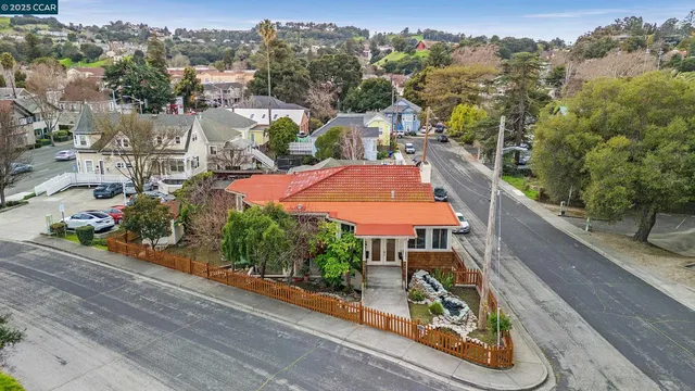 an aerial view of a swimming pool patio and mountain view