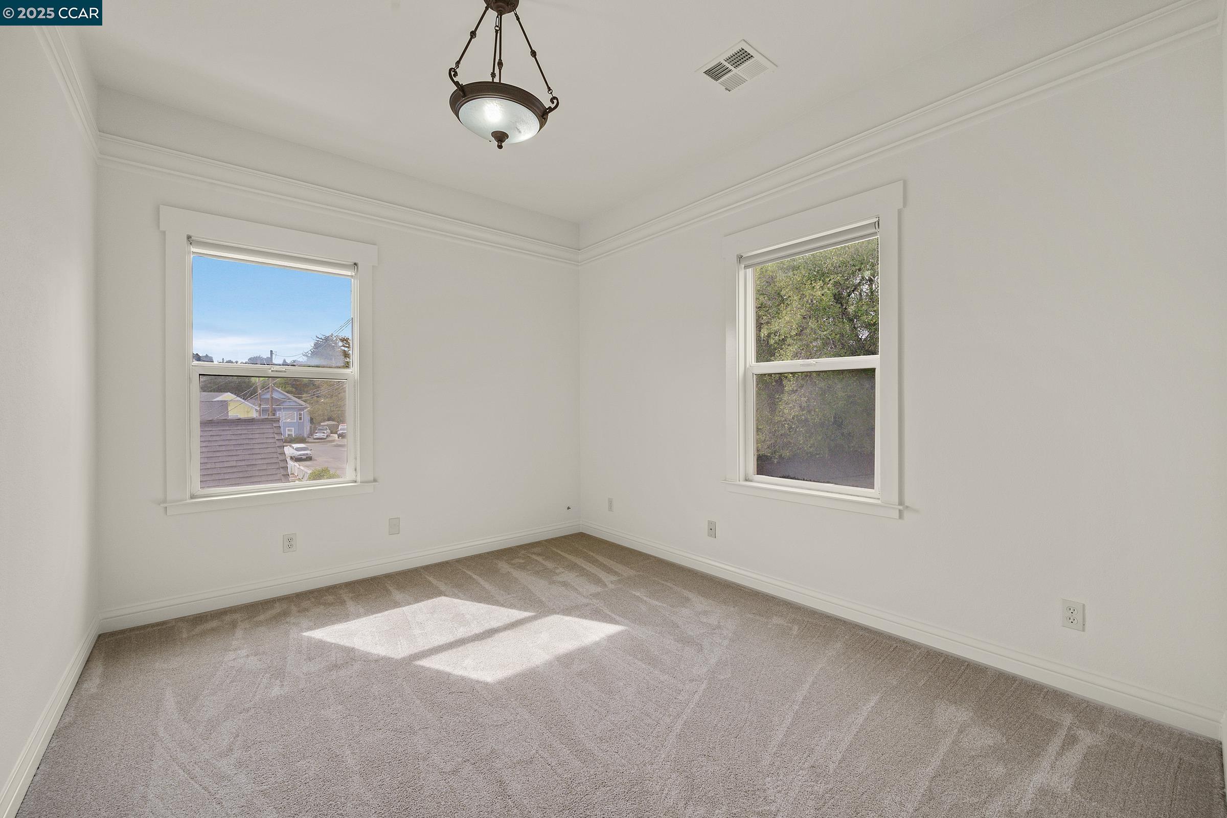 2581 Charles Avenue Pinole, CA 94564 - Photo 8 of 50 an empty room with a window