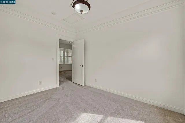 an empty room with an entryway