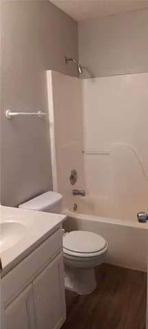a bathroom with a toilet a sink and a bathtub