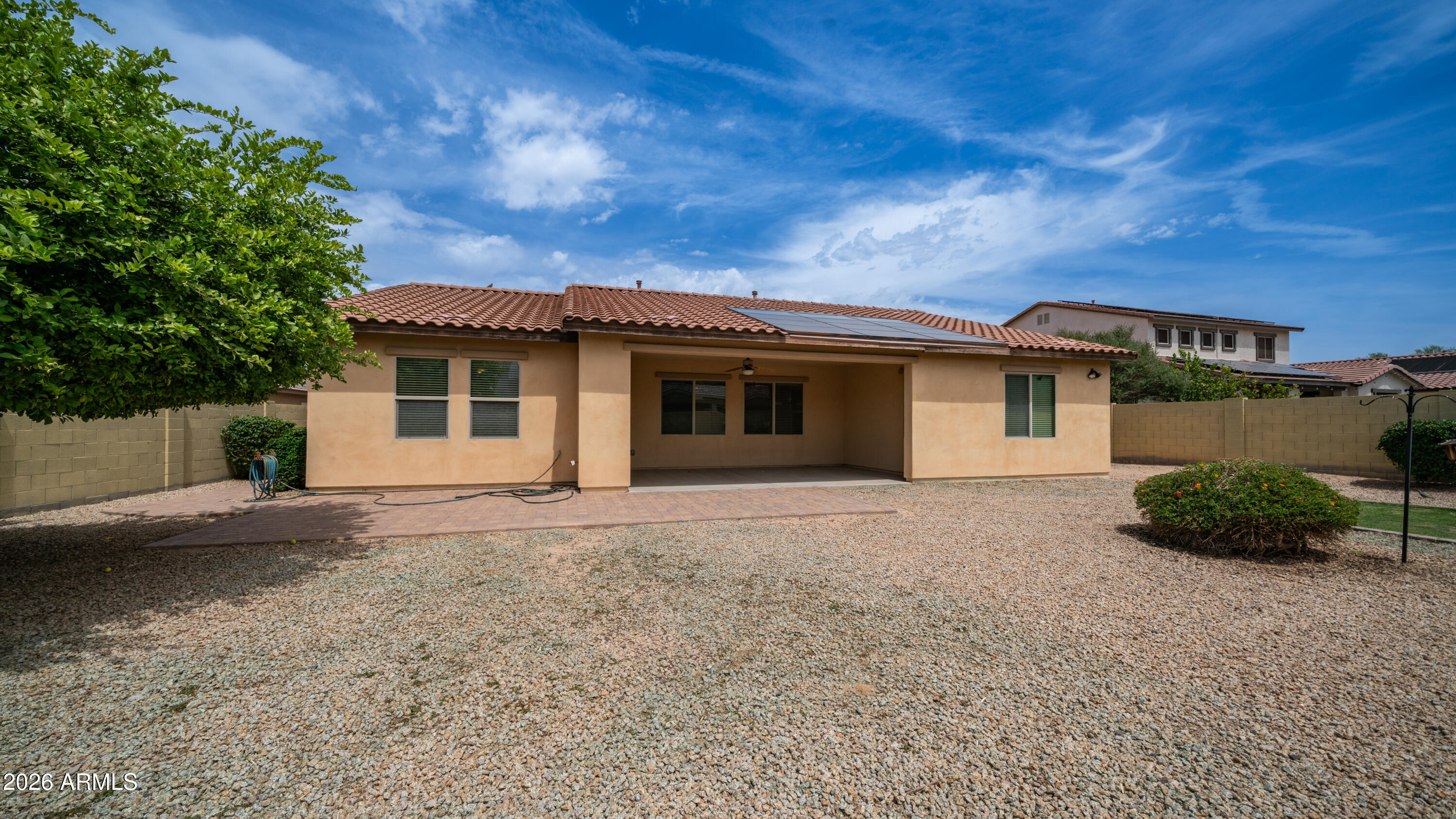 16159 West Granada Road Goodyear, AZ 85395 - Photo 38 of 41 front view of a house with a yard