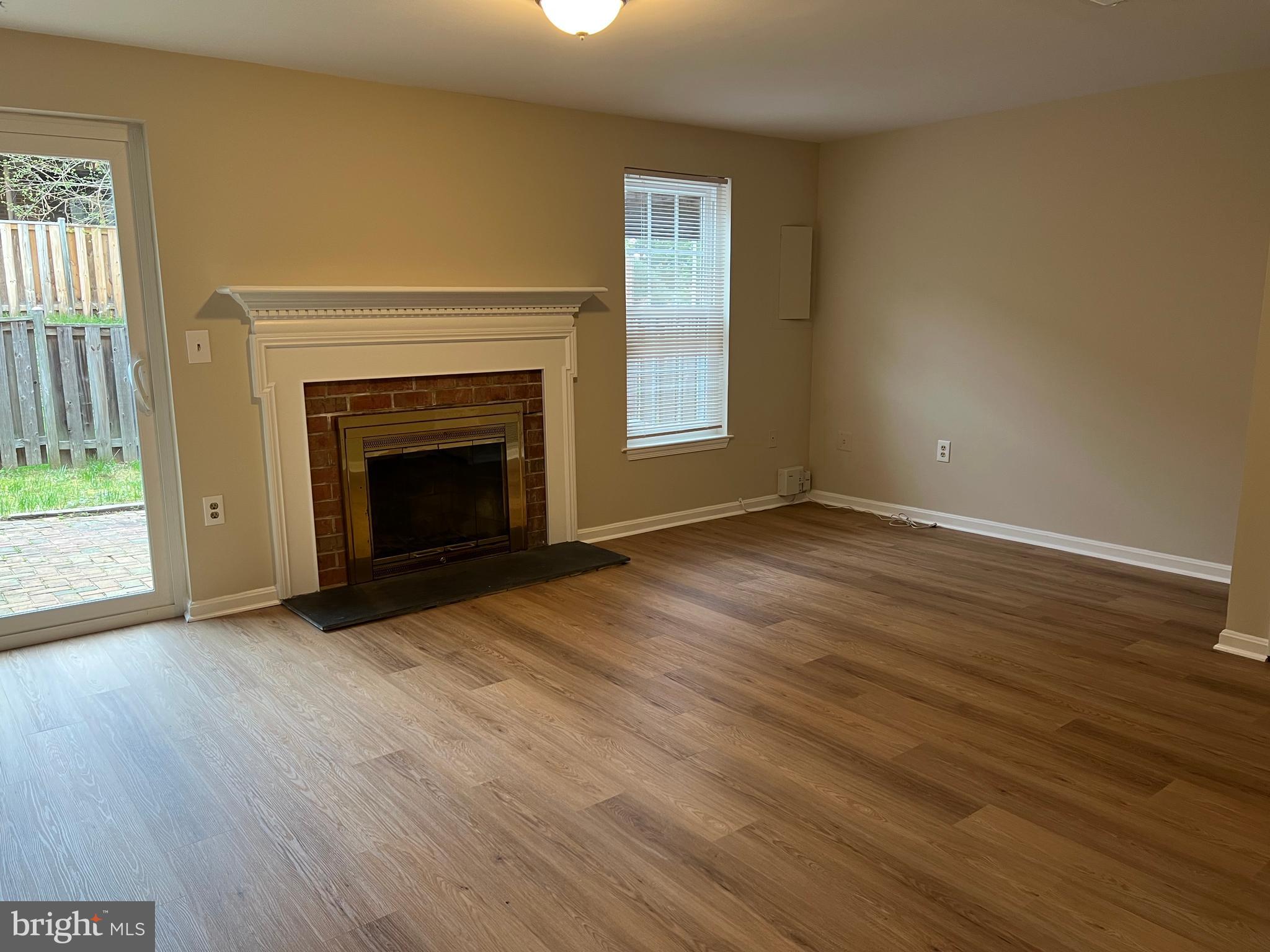 7804 Wintercress Lane Springfield, VA 22152 - Photo 45 of 64 Family room w/ wood burning fireplace