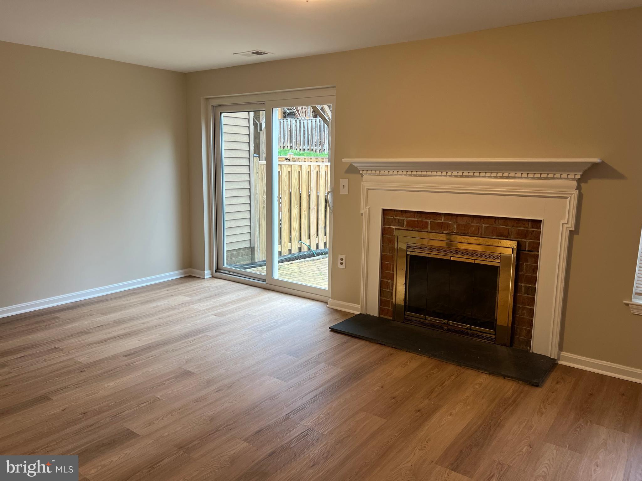 7804 Wintercress Lane Springfield, VA 22152 - Photo 46 of 64 Family room with sliding glass door to back yard