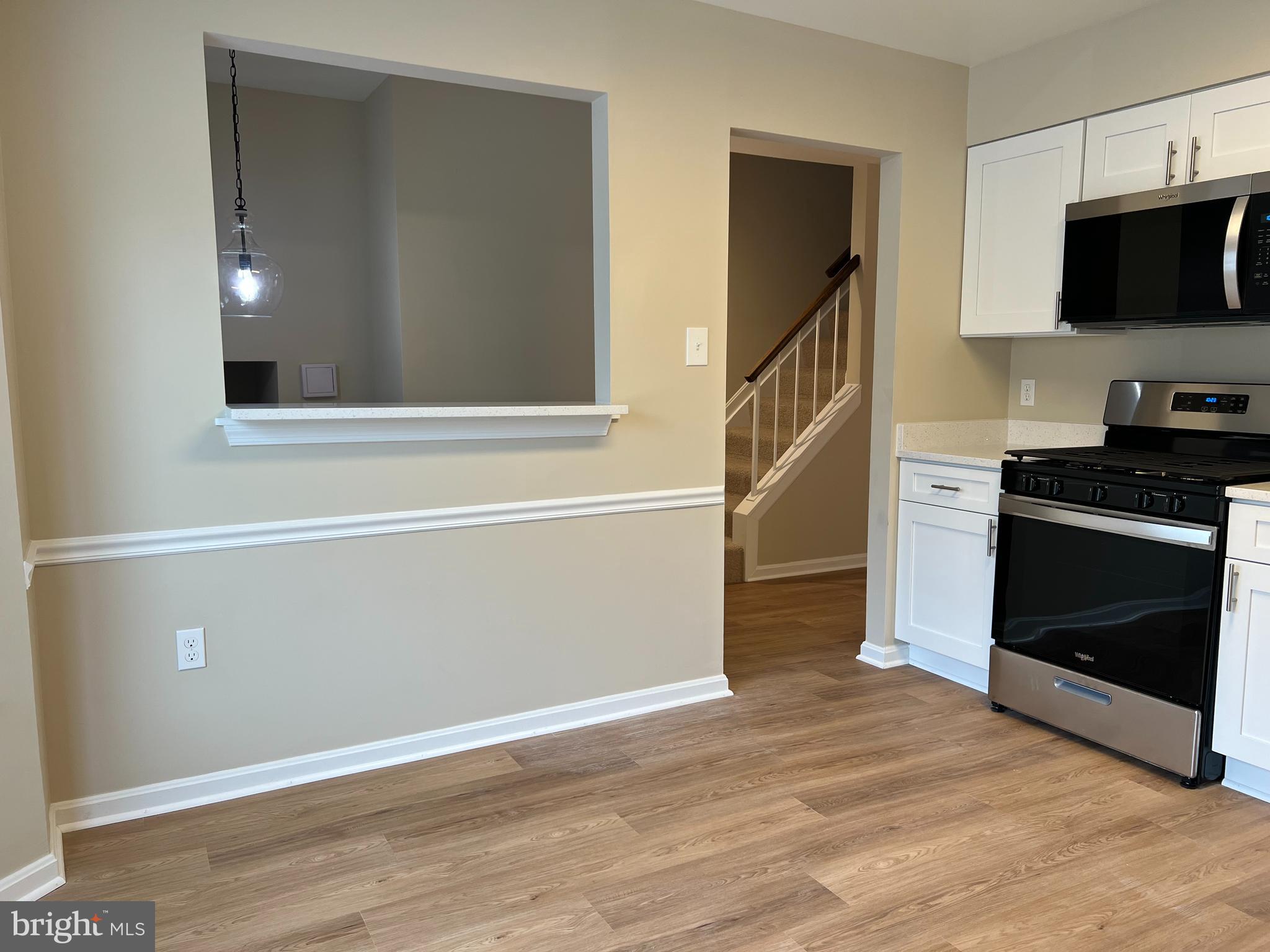 7804 Wintercress Lane Springfield, VA 22152 - Photo 7 of 64 Kitchen with new luxury vinyl plank flooring