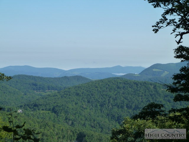 C-23 Broken Arrow Trail Boone, NC 28607 - Photo 1 of 11 a view of a town with mountains in the background